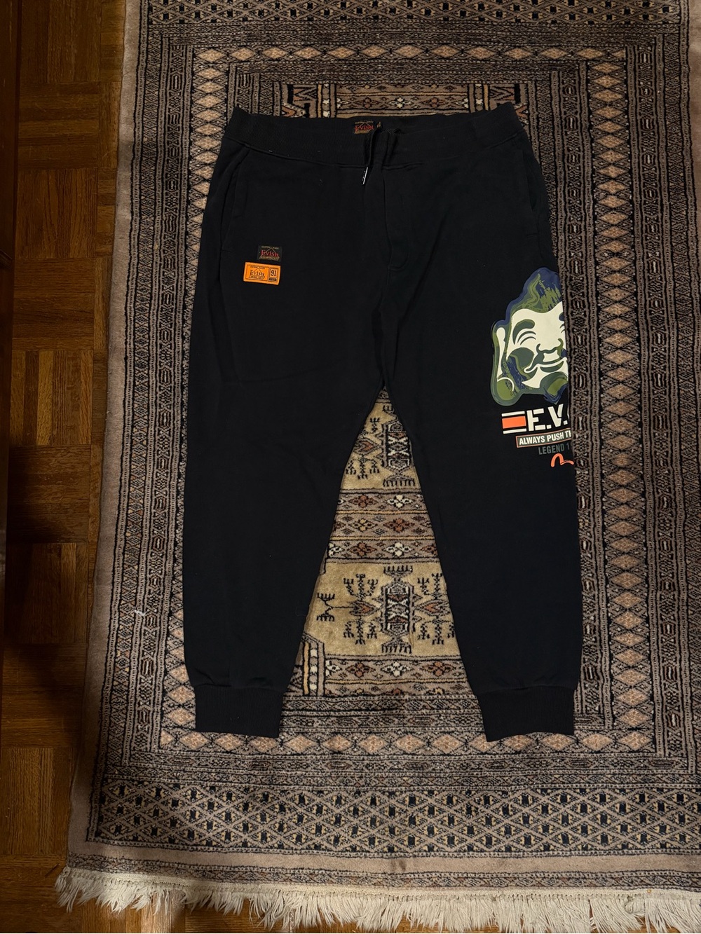 Evisu Black Joggers with Bold Green Graphic